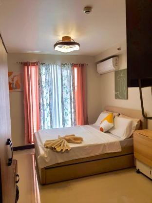 Condo with POOL/BALCONY/KITCHEN/NETFLIX/HOT SHOWER Apartment in Lapu-Lapu City