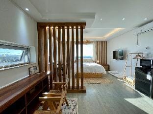 C#1 West Sunset View Full Window Distant Sea View Rattan Wood Room Villa in South Korea