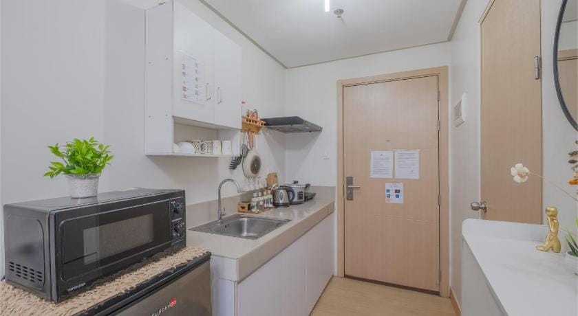 Cozy Whole Condo Staycation at Trees Residences Apartment in Quezon City