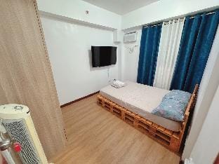 Cozy Condo w/ balcony 5 mins to Abreeza G-mall Vacation rental in Davao City