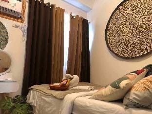 Serene Native-Inspired Condo Vacation rental in Quezon City