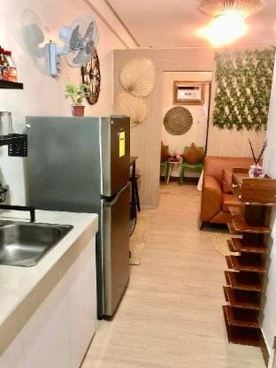 Serene Native-Inspired Condo Vacation rental in Quezon City