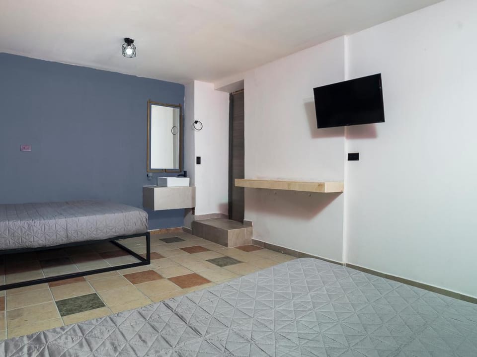 Adhoc Cintermex Capsule hotel in Monterrey