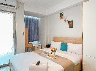 MinimalistCozy Studio Tamansari Iswara By Travelio Apartment in West Java