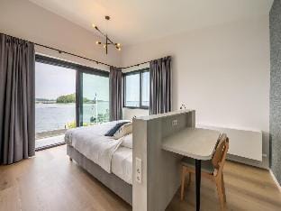 Attractive villa with jetty Vacation rental in Kamperland
