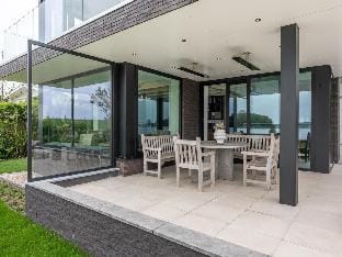 Attractive villa with jetty Vacation rental in Kamperland