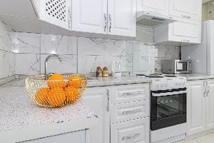 Separate rooms and a desk, KhanShatyr Apartment in Kazakhstan