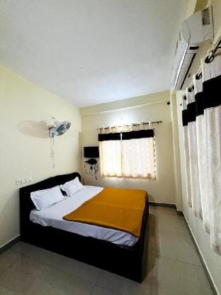 Dhanalakshmi Hotel and Lodge Apartment in Kerala