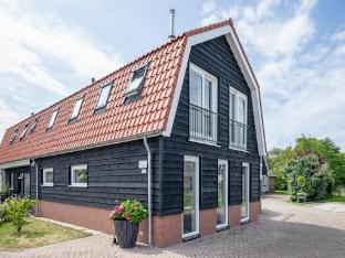 Holiday home near forest with wellness garden Vacation rental in De Koog