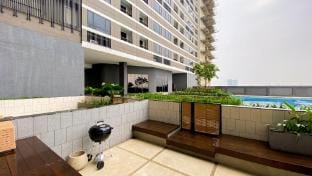 Elegant 2BR at Collins Boulevard Apt By Travelio Apartment in West Java