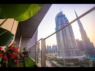 Cozy Haven 1BR Downtown LED Burj & Fountain View Vacation rental in Dubai