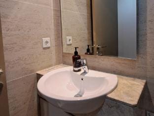 Comfort and Luxury Private Room at Gold Coast PIK Apartment in Jakarta