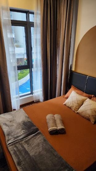K-Avenue with PS5, Pool View and Private Balcony Apartment in Kota Kinabalu