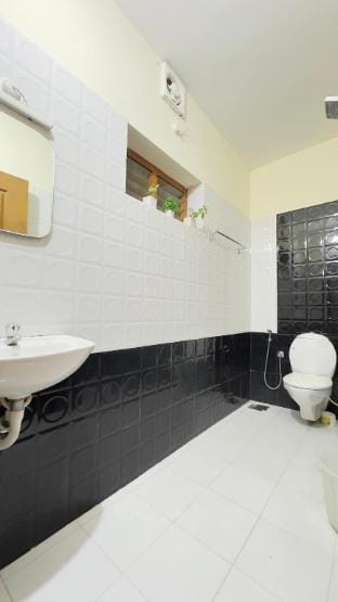 Alchemist Homes Private AC Room Apartment in Thiruvananthapuram