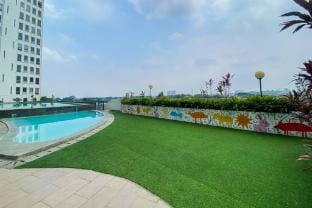 Chic Cozy Studio @Patraland Urbano Apt By Travelio Apartment in West Java