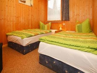 Feriensiedlung Am Grundlossee in Sewekow Vacation rental in Mecklenburgische Seenplatte