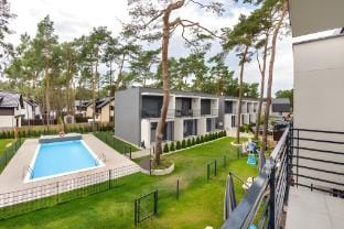 story holiday home with a garden and a pool Vacation rental in West Pomeranian Voivodeship, Poland