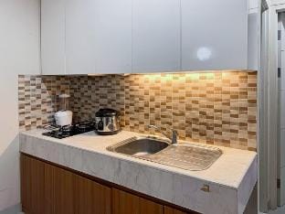 Cozy 2BR Apt Trivium w/ Pool, Gym, WiFi by 2ndHome Vacation rental in West Java