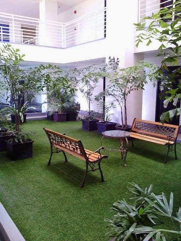 Modern 1BR Condo + Balcony & Pool, next to SM Mall Apartment in Cagayan de Oro
