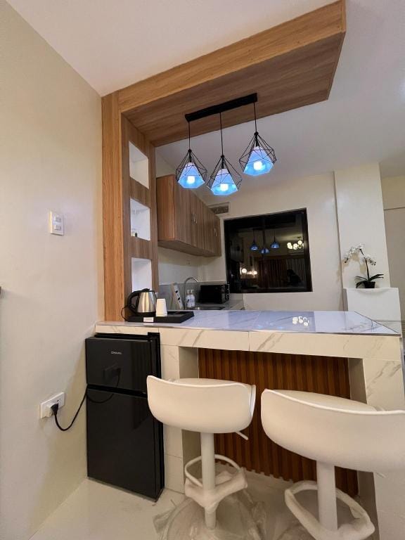 homefortzone Lipa/ netflix/pool/wifi/interiored Apartment in Calabarzon