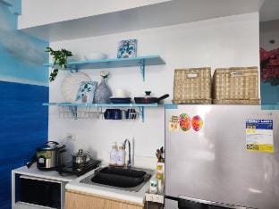 Santorini Escape in Bacolod - Amaia Steps Capitol Apartment in Bacolod