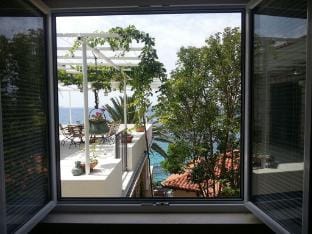 Villa Mirjana - One Bedroom Apartment with Terrace and Side Sea View Taverna Apartment in Mlini