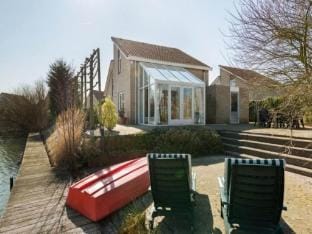 Bungalow in Zeeland with Stunning Waterside Views Vacation rental in Zeeland, Netherlands