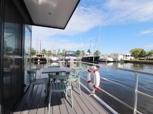 Houseboat in Lemmer with Harbor Views Vacation rental in Friesland, Netherlands