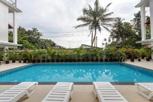 Lush 2BHK Apartment Casa de Coco by Earthyrooms Vacation rental in Goa, India