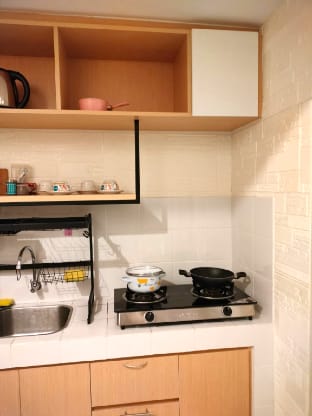 Cozy Riverside Retreat | Your Home Away in PIK2 Apartment in West Java
