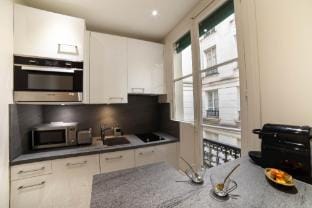 The Charming Rue Cler Apartment in Paris