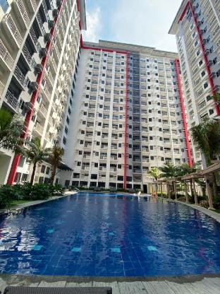 Cozy Blossom 2Br + WiFi+Netflix:Near Airport/NAIAX Apartment in Muntinlupa