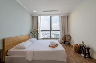 • Hi Hi • 방4개+침대4개+화장실2개/수영장/헬스장/공항에서 숙소까지 15분 Apartment in Ho Chi Minh City