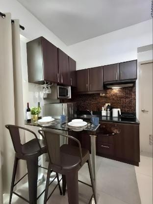 Deluxe Corner Studio | Stamford McKinley Hill Vacation rental in Makati
