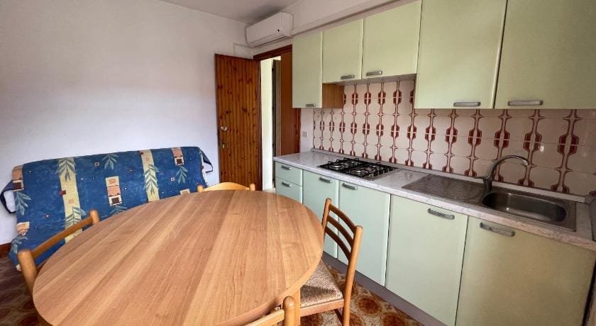 Accommodation with shared garden close to the sea Apartment in Rosolina Mare