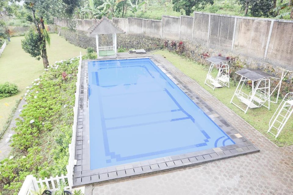 Collection O Bogor Puncak Near Gunung Mas Formerly Villa Bunga Bunga Hotel in Cisarua