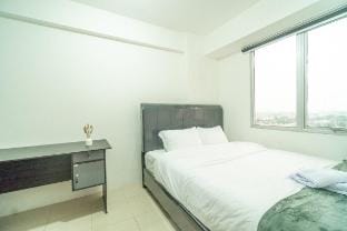 Simple 2 bedroom above mall bassura / Netflix Apartment in Jakarta
