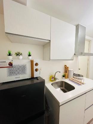 Boho inspired condo with PS4 in San Fernando Apartment in Calabarzon