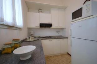 Flat in semi detached villa with private garden Apartment in Bibione