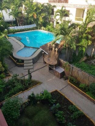 Luxury 4BR Apartment with Pool behind Alona Beach Apartment in Panglao