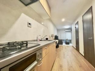 Kagayaki：格安！寝室は２部屋。最大７名宿泊可能！関西空港から直通で観光にも便利。 Vacation rental in Osaka