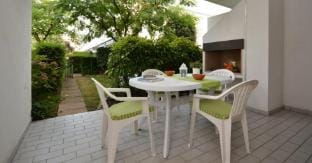 Villa with private garden and 2 covered terraces Apartment in Bibione
