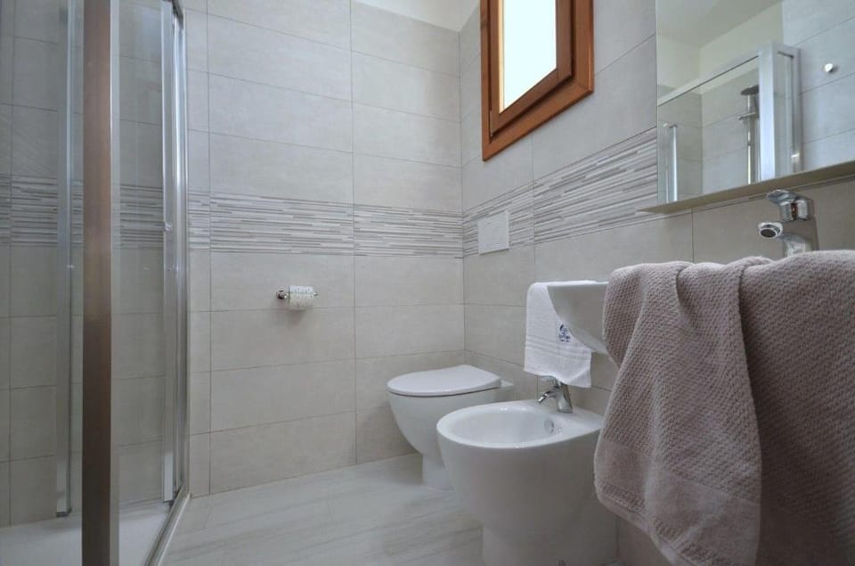 Contemporary studio flat in the main shopping road by Beahost Rentals Apartment in Bibione