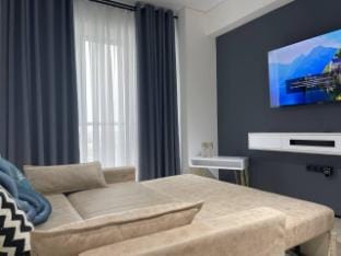 Белая студия на небоскрёбе Акай сити Apartment in Europe