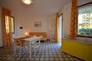 Studio flat with private garden and swimming pool by Beahost Rentals Apartment in Bibione