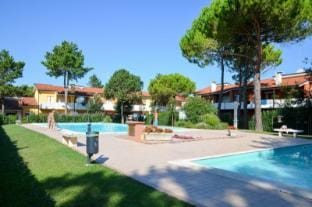 Holiday escape in a modern residence with pool by Beahost Rentals Apartment in Bibione