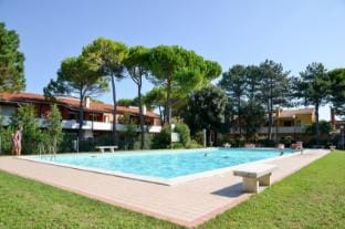 Family house with garden and pool by Beahost Rentals Apartment in Bibione