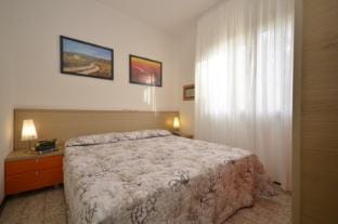 Lovely and cozy apartment with pool and garden by Beahost Rentals Apartment in Bibione