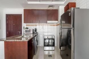 Lux 1BR Apt in Court Tower with partial Sea View Vacation rental in Dubai