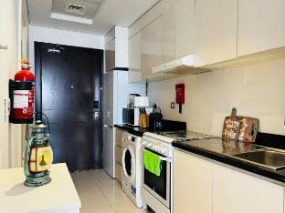 Top Floor Bliss: Skyline View in JVC near Marina Vacation rental in Dubai